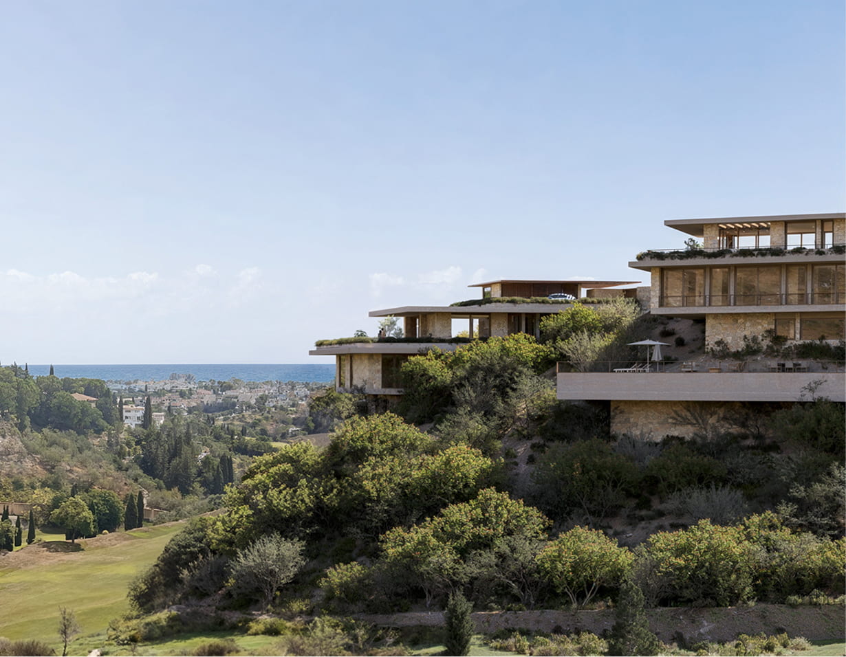 Aerial view of villas with sea backdrop