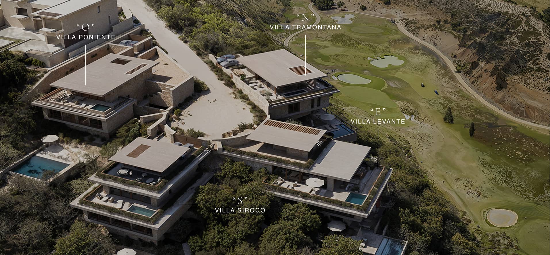 Aerial view of Las Brisas villas beside the Los Flamingos golf course